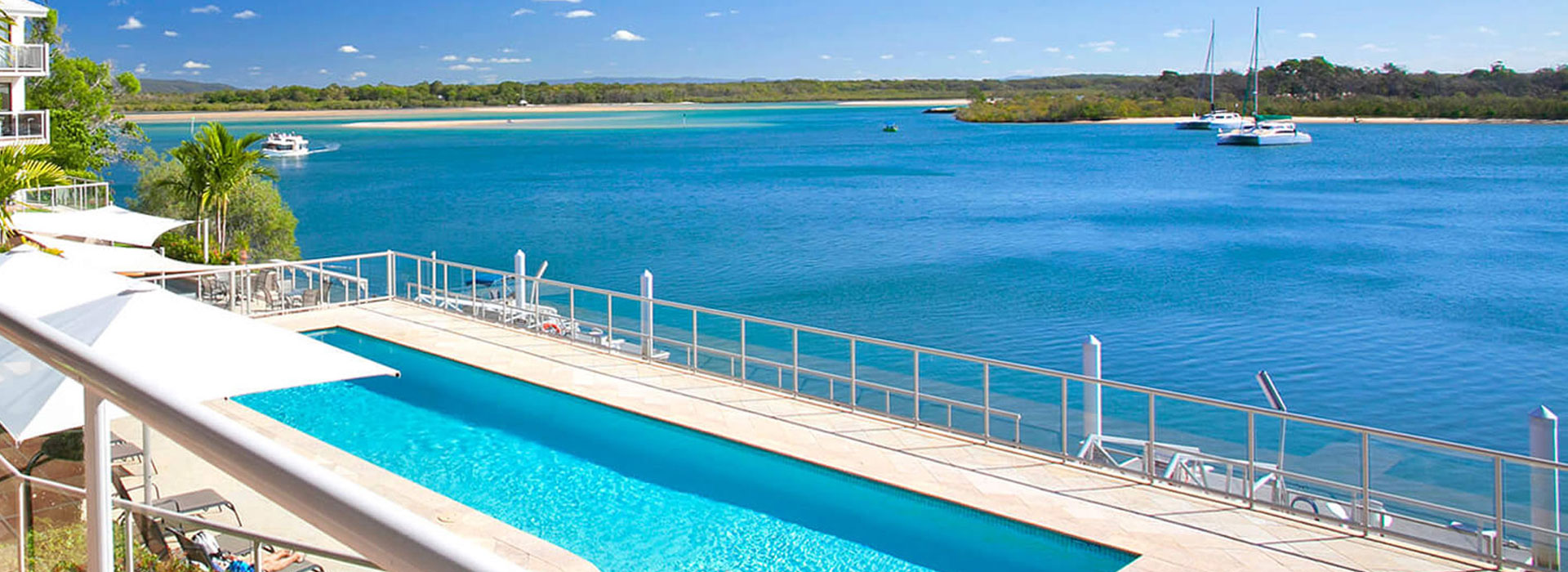 Noosa Shores Waterfront Resort two bedroom deluxe apartment pool