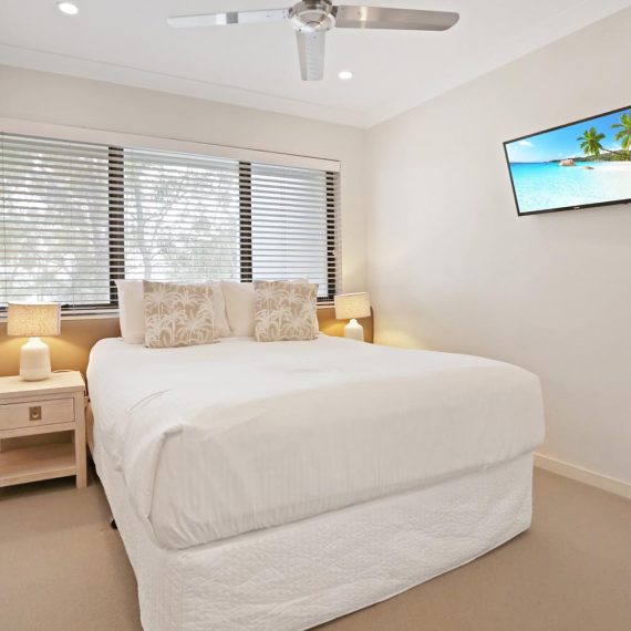 Noosa Shores Resort 2 bed Deluxe bedroom with television