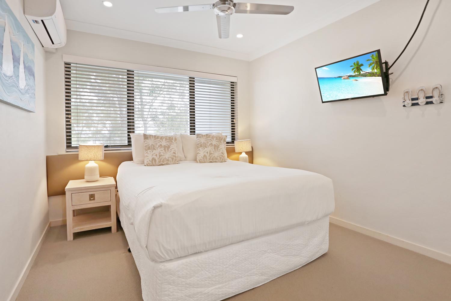 Noosa Shores Resort 2 bed Deluxe bedroom with television
